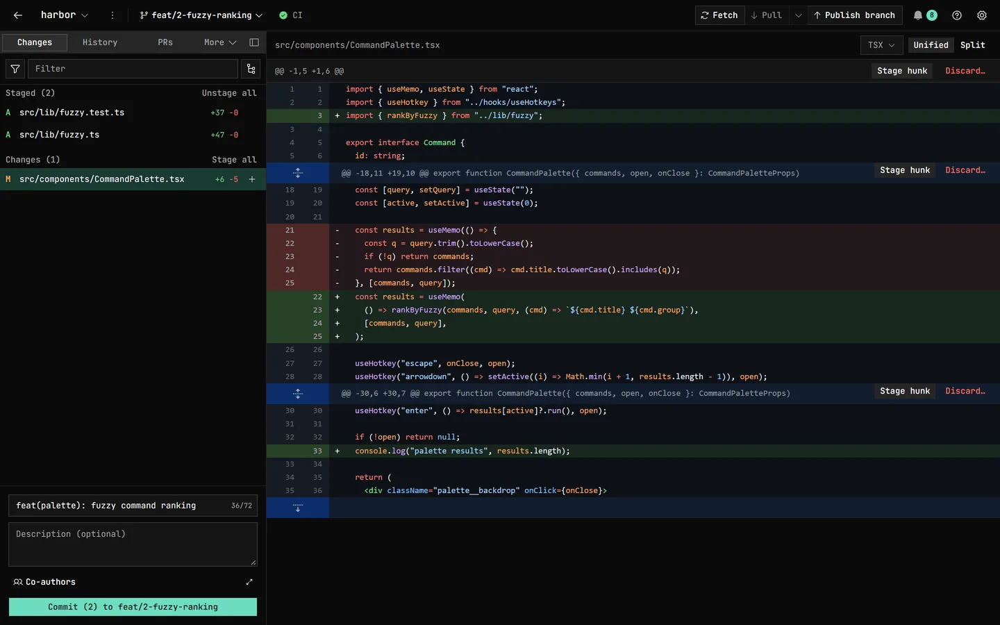 GitDesktop's Changes view: a TypeScript diff with Stage hunk and Discard controls on every hunk, two files already staged, and a commit title ready in the composer